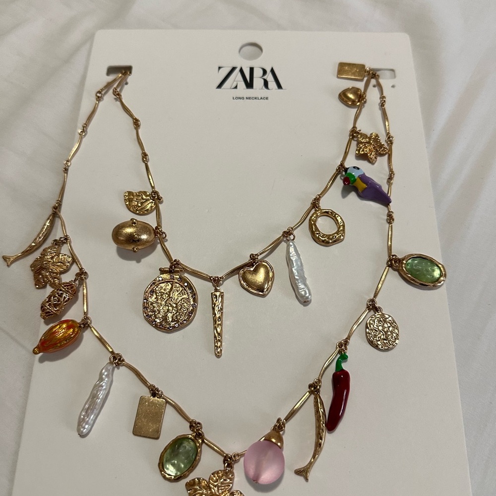 Layered Zara charm necklaces